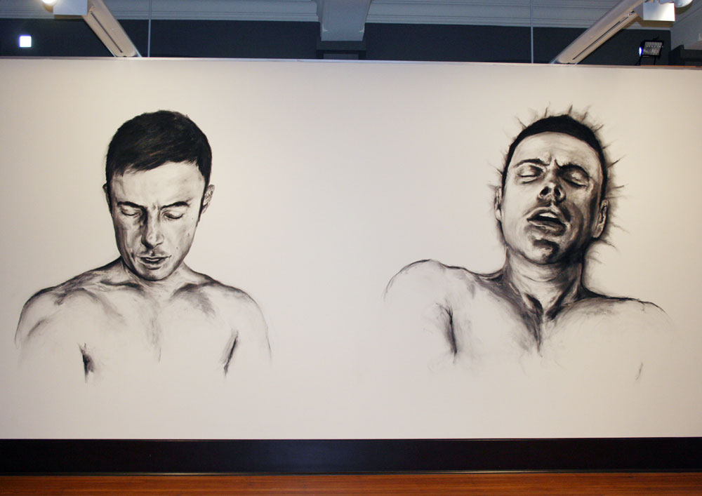 (left) Luke Thurgate, Self portrait as top, 2010, Charcoal wall drawing Dimensions variable  (right) Luke Thurgate, Self portrait as bottom, 2010, Charcoal wall drawing Dimensions variable