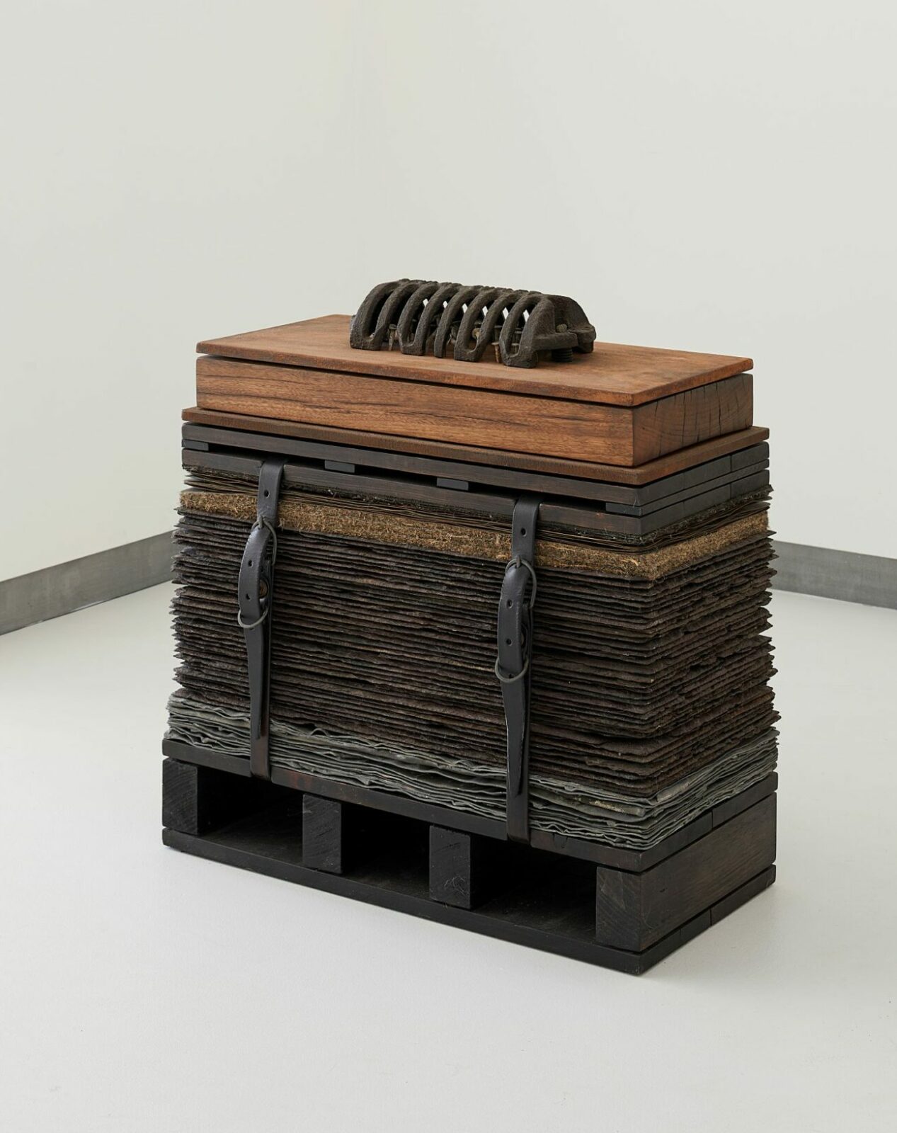 Benjamin Gallagher, Compression of a Trade, 2022, hardwood, lead, welsh slate, wool underlay, copper, bitumen, steel, oregon, leather, salvaged iron casting and hand forged clouts, 52 x 26.5 x 54 cm, photo: Alex McIntyre Photography