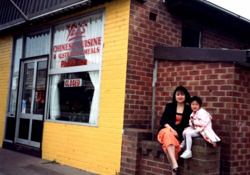 Family photo of the artist's mother and sister outside the family's restaurant, 1993